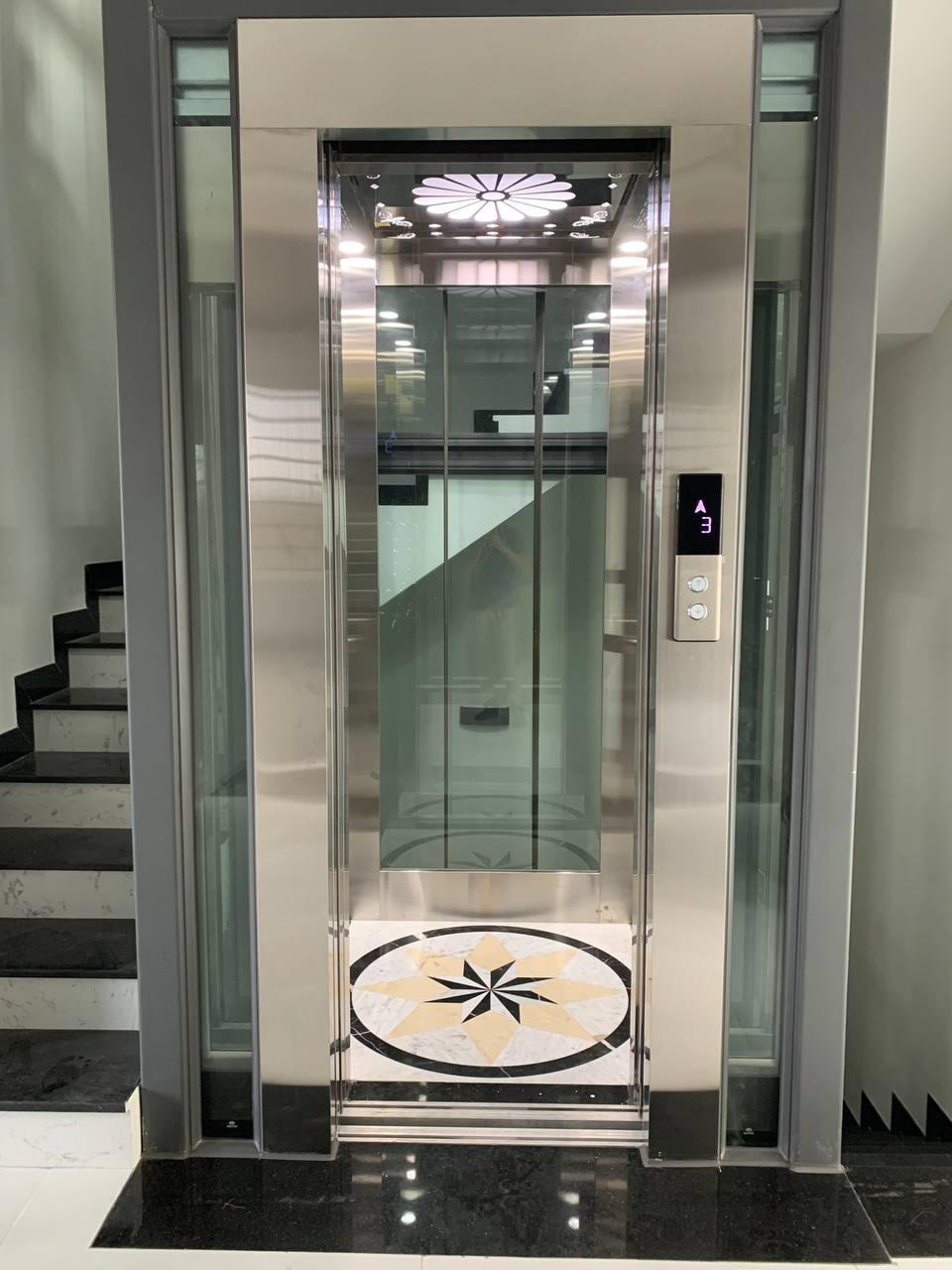 Nghệ thuật và kỹ thuật trong thiết kế thang máy lồng kính nhà anh Sơn - KDC Vĩnh Lộc